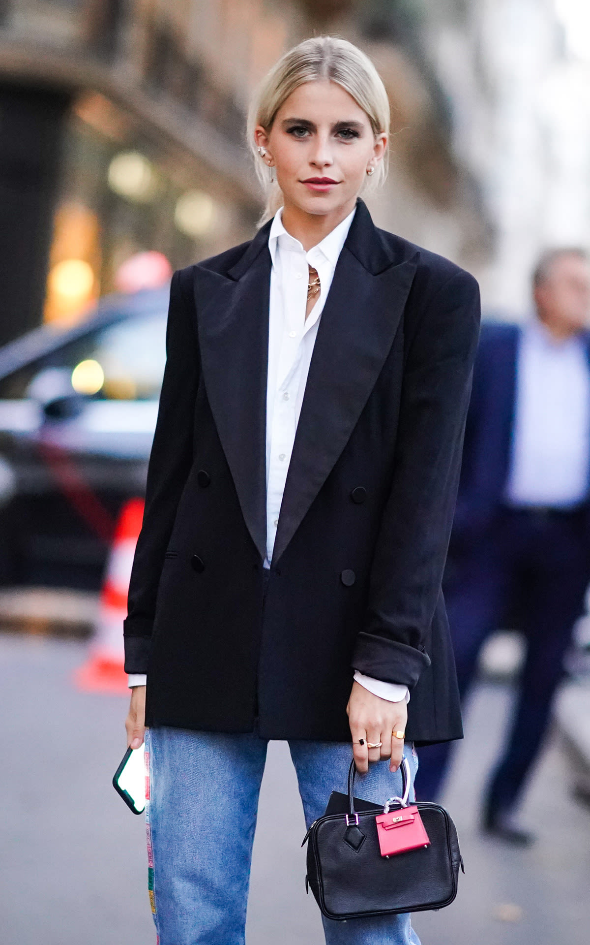 Street style star wearing black blazer
