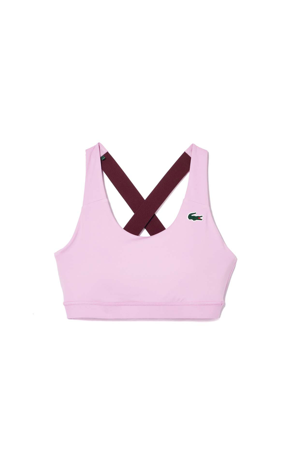 Top de deporte rosa lacoste outlet madrid las rozas village