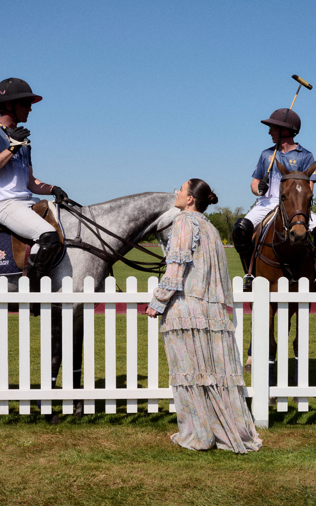 Jessie Ware watching guards polo on horse