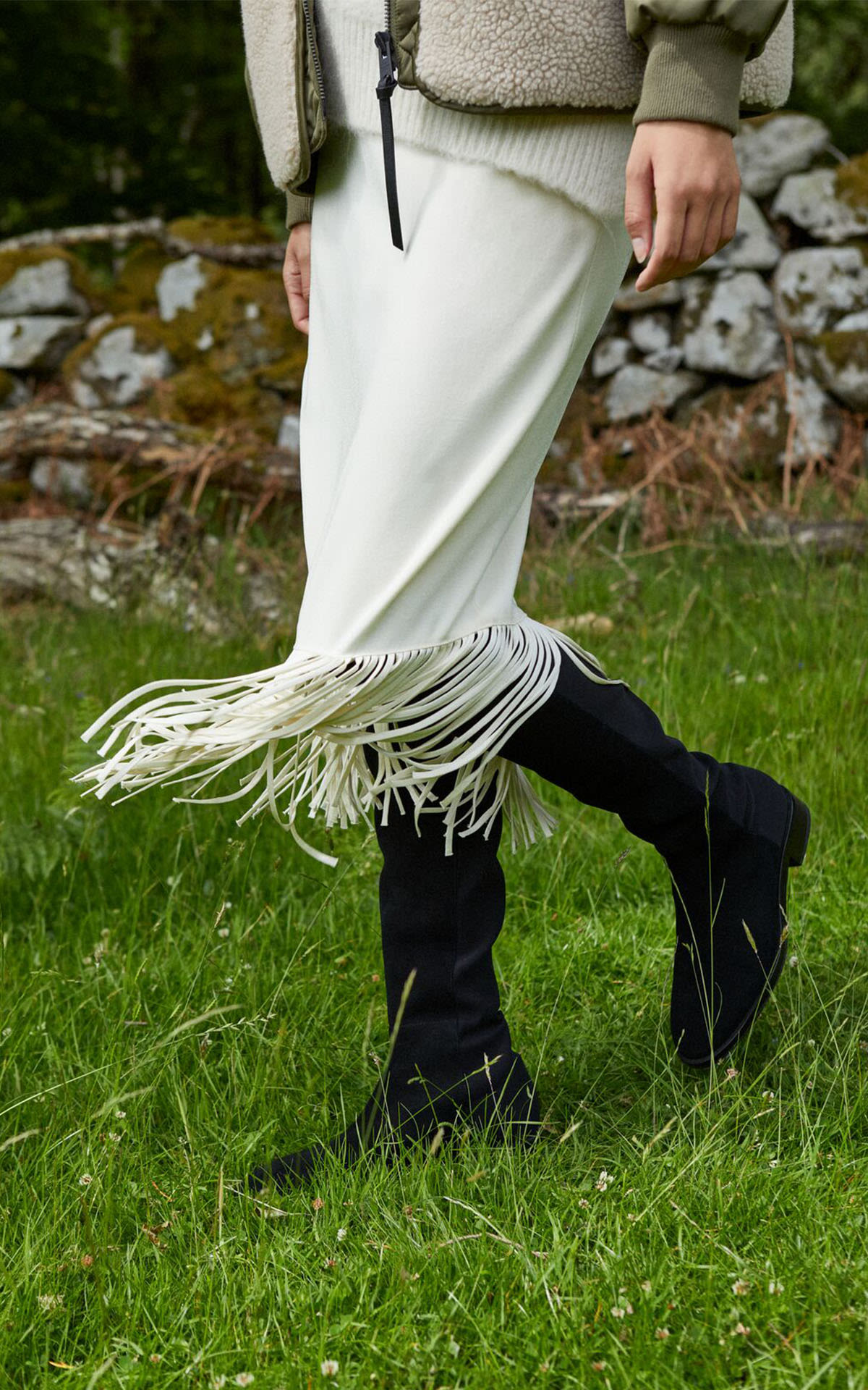 fringed-skirt-and-black-boots
